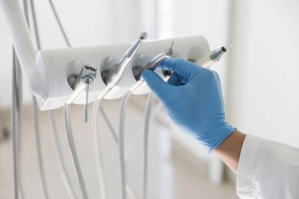 Professional Emergency Dentist technician working in Wixom, MI